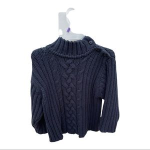 Navy blue sweater with buttons on the left shoulder